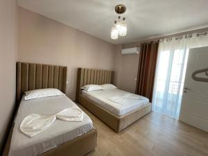 Кровать или кровати в номере Soleil Summer Apartments