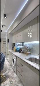 Η κουζίνα ή μικρή κουζίνα στο Luxury Apartment in the Center 6