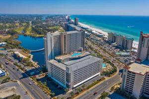 an aerial view of a city and the ocean at Sea-Renity at Laketown Wharf #1607 by Nautical Properties in Panama City Beach
