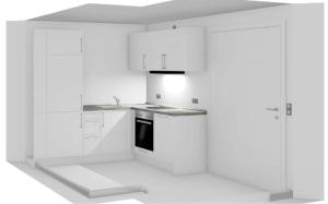 eine weiße Küche mit weißen Schränken und einem Herd in der Unterkunft Spacious 4 Bedroom Apartment near City Center in München + 13 Fotos