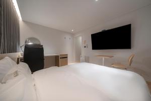 Letto o letti in una camera di Aank Hotel Daejeon Yuseong 1st