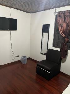 TV a/nebo společenská místnost v ubytování El mochilero