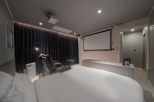 Letto o letti in una camera di Aank Hotel Daejeon Yuseong 1st