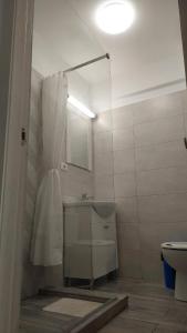 Koupelna v ubytování VEL Beach Apartment