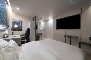 Aank Hotel Daejeon Yuseong 2nd電視和／或娛樂中心