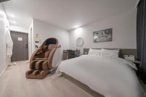 Aank Hotel Daejeon Yuseong 2nd房間的床