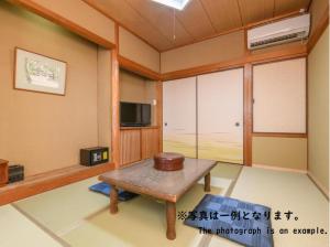 Tabist Asanokan Annex Iroha Ise的电视和/或娱乐中心
