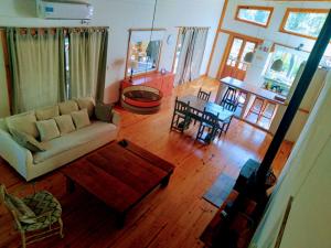 a living room with a couch and a table at Delta tigre in Tigre