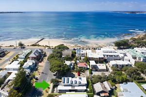 an aerial view of a town next to the beach at Beach Haven in Point Lonsdale