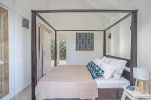 Una cama o camas en una habitación de PARADISE BAY