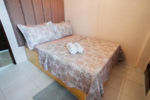 Postel nebo postele na pokoji v ubytování Cozy BNB - Unit L