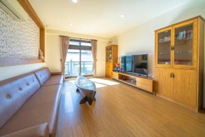 TV i/ili multimedijalni sistem u objektu Tian Nian B&B