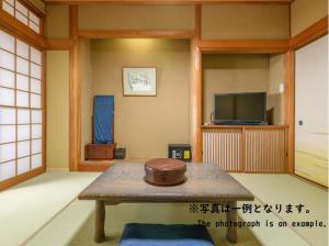 Tabist Asanokan Annex Iroha Ise的电视和/或娱乐中心