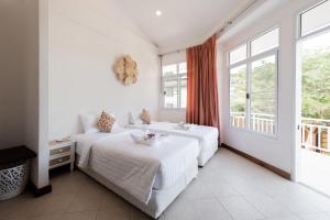Postel nebo postele na pokoji v ubytování Twin Villas Ao Nang + 37 fotografií