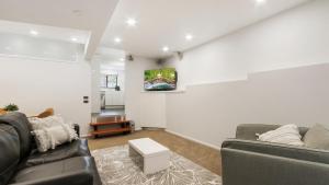 a living room with a couch and a table at Brockhoff Lachen in Mount Hotham