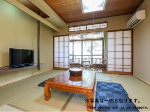 Tabist Asanokan Annex Iroha Ise的电视和/或娱乐中心