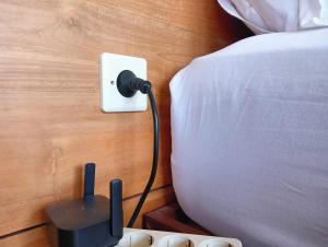 Postel nebo postele na pokoji v ubytování Kama Ayu Bungalow