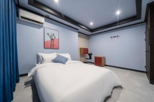 Rúm í herbergi á Shourin Hotel Daejeon by Aank