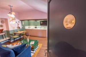 Kuchyň nebo kuchyňský kout v ubytování Le vintage . Centre-ville Mâcon . Atypique . Proche gare . Wifi . Climatisation . Confortable .