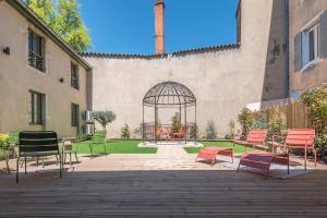 Zahrada ubytování Le vintage . Centre-ville Mâcon . Atypique . Proche gare . Wifi . Climatisation . Confortable .