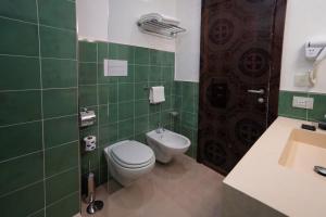 Koupelna v ubytování Hotel Schuhmann