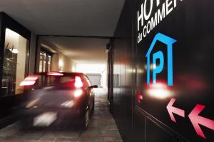 a car parked in front of a parking garage at Congress Apartments by Hotel du Commerce in Basel