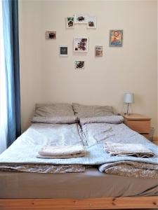 Posteľ alebo postele v izbe v ubytovaní Aurora Apartments