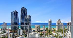 a view of a city with tall buildings and the ocean at Deluxe Private Apartment and Studio - Ocean Views in Gold Coast