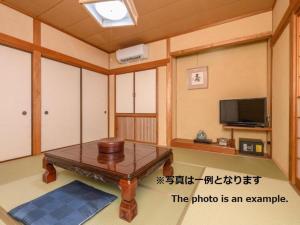 Tabist Asanokan Annex Iroha Ise的电视和/或娱乐中心