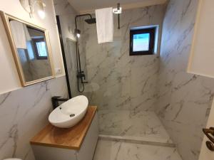 A bathroom at Bloom Apartament