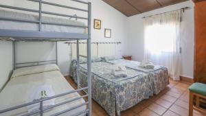 Posteľ alebo postele v izbe v ubytovaní Casa Rural Bellas Vistas Ildefonso La Puebla de Los Infantes by Ruralidays