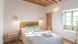 Posteľ alebo postele v izbe v ubytovaní Cortijo Vallehermoso Campillos by Ruralidays