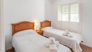 Posteľ alebo postele v izbe v ubytovaní Cortijo Vallehermoso Campillos by Ruralidays