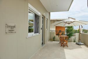 A balcony or terrace at Friday Collection
