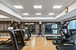 a gym with treadmills and elliptical machines at Jumeirah Burj Al Arab Dubai in Dubai