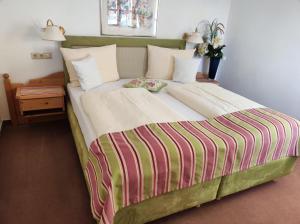Ένα ή περισσότερα κρεβάτια σε δωμάτιο στο Aparthotel Fackler