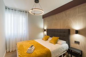 Łóżko lub łóżka w pokoju w obiekcie Villa Hita apartment by People Rentals