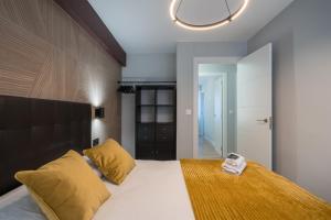 Łóżko lub łóżka w pokoju w obiekcie Villa Hita apartment by People Rentals