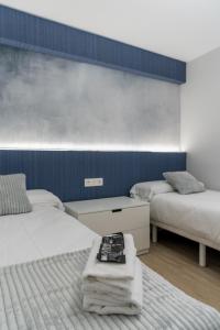 Łóżko lub łóżka w pokoju w obiekcie Villa Hita apartment by People Rentals