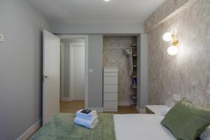 Łóżko lub łóżka w pokoju w obiekcie Villa Hita apartment by People Rentals