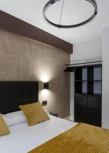 Łóżko lub łóżka w pokoju w obiekcie Villa Hita apartment by People Rentals