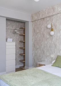 Łóżko lub łóżka w pokoju w obiekcie Villa Hita apartment by People Rentals