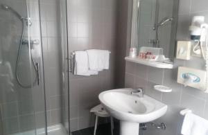 Ванная комната в Hotel Giò Wine e Jazz Area