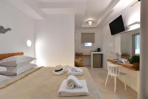 Kuchyň nebo kuchyňský kout v ubytování Ammos Luxury Rooms & Home