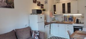 Kuchyň nebo kuchyňský kout v ubytování DLX Apartman Adriatics