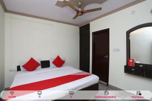 Ένα ή περισσότερα κρεβάτια σε δωμάτιο στο Hotel O Vanshika +24 φωτογραφίες