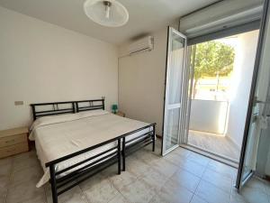 Postel nebo postele na pokoji v ubytování Venere Apartament