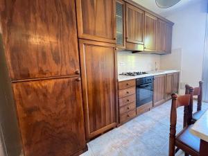Kuchyň nebo kuchyňský kout v ubytování Venere Apartament