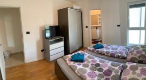 Kuchyň nebo kuchyňský kout v ubytování Meli Maisonette Apartments