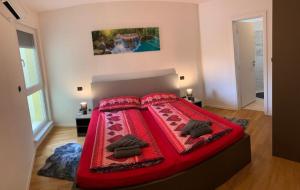 Postel nebo postele na pokoji v ubytování Meli Maisonette Apartments